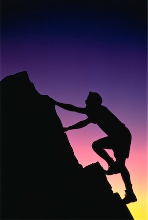 silo man rock climber - Silhouette of Man Rock Climbing At Sunset Stock Photo - Rights-Managed, Code: 700-00014539