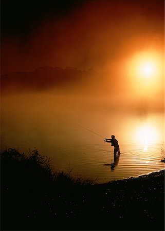 fishing dawn tranquil - Silhouette of Man Fly Fishing at Sunset, British Columbia, Canada Stock Photo - Rights-Managed, Code: 700-00014568