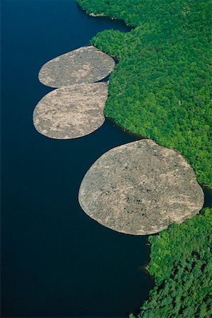 rio ottawa - Log Booms Ottawa River, Ontario, Canada Foto de stock - Direito Controlado, Número: 700-00014934