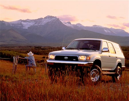 ranchers - Man Looking at Mountain Range Near Truck Stock Photo - Rights-Managed, Code: 700-00015089