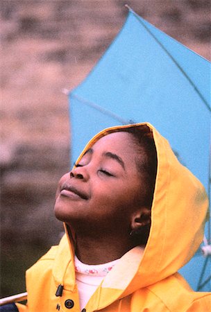 Girl in Raingear Holding Umbrella Stock Photo - Rights-Managed, Code: 700-00015310