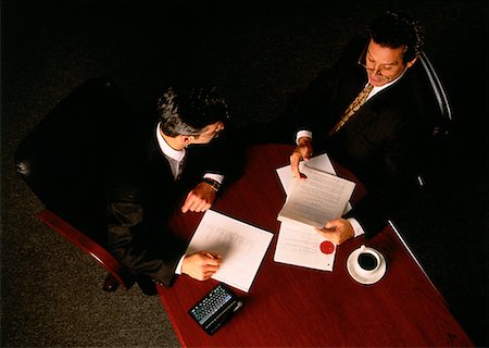 Les hommes d'affaires en réunion Photographie de stock - Rights-Managed, Code: 700-00015351