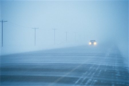 snow blizzards highway - Car Driving Through Snow Storm Stock Photo - Rights-Managed, Code: 700-00015413