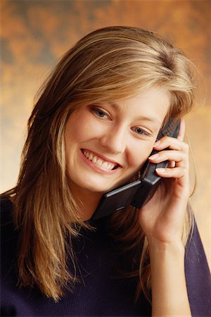 Woman Using Cordless Telephone Stock Photo - Rights-Managed, Code: 700-00016120
