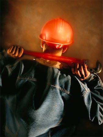 engrenagens - Construction Worker Holding Wrench Foto de stock - Direito Controlado, Número: 700-00016601