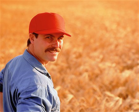 Man in Barley Field Elie, Manitoba, Canada Stock Photo - Rights-Managed, Code: 700-00016982