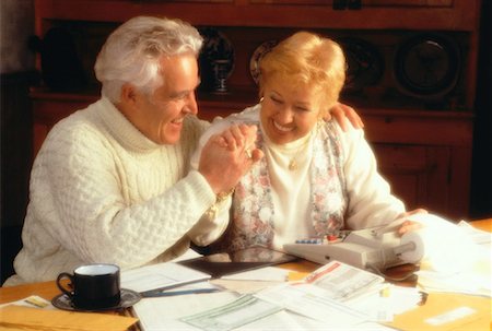 Mature Couple Paying Bills Stock Photo - Rights-Managed, Code: 700-00017029