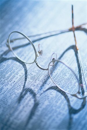 Eyeglasses and Financial Pages Fotografie stock - Rights-Managed, Codice: 700-00017123
