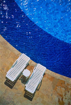 Overhead View of Deck Chairs Next To Swimming Pool Cancun, Mexico Stock Photo - Rights-Managed, Code: 700-00017198