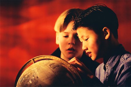 Two Boys Looking at Globe Stock Photo - Rights-Managed, Code: 700-00017435
