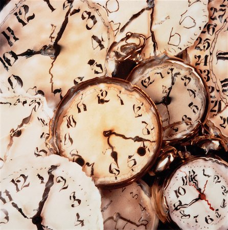 Distorted Clock Faces Fotografie stock - Rights-Managed, Codice: 700-00017840