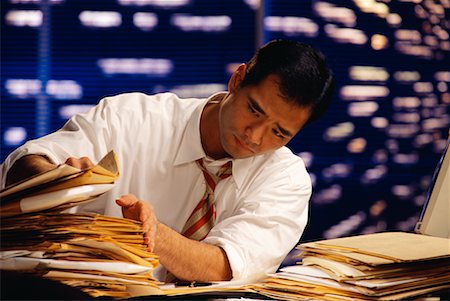 simsearch:700-00552174,k - Businessman Working in Office Stock Photo - Rights-Managed, Code: 700-00017946