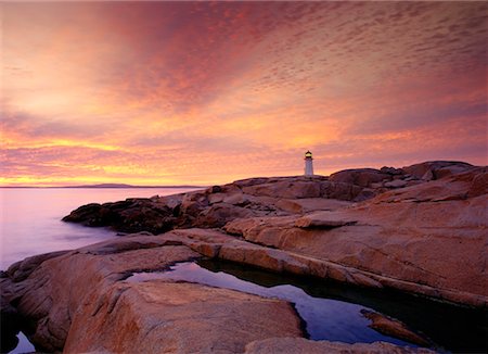 Lighthouse at Sunset Peggy's Cove, Nova Scotia, Canada Stock Photo - Rights-Managed, Code: 700-00017988