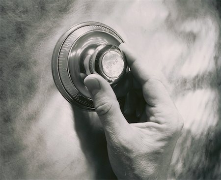 private banking - Close-Up of Hand Turning Combination Lock on Safe Stock Photo - Rights-Managed, Code: 700-00018615