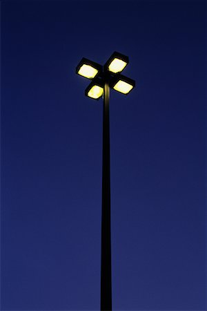 simsearch:700-00170531,k - Looking Up at Street Lamps at Night Foto de stock - Con derechos protegidos, Código: 700-00018885