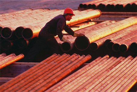 Worker in Pipeyard Edmonton, Alberta, Canada Stock Photo - Rights-Managed, Code: 700-00019031