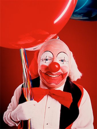 simsearch:700-00197963,k - Portrait of Clown Holding Balloon Stock Photo - Rights-Managed, Code: 700-00019275