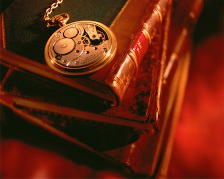 pocket watch - Pocket Watch on Stack of Books Stock Photo - Rights-Managed, Code: 700-00019639