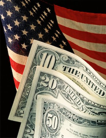 Close-Up of American Flag and Currency Fotografie stock - Rights-Managed, Codice: 700-00010417