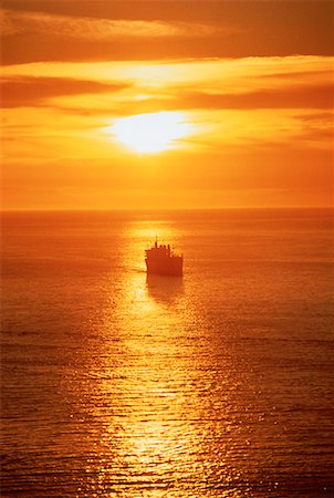 simsearch:700-05855343,k - Silhouette of Ship at Sunset Vancouver, British Columbia Canada Stock Photo - Rights-Managed, Code: 700-00010579