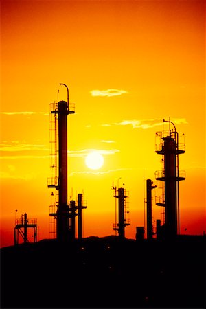 simsearch:700-00029411,k - Silhouette of Oil Refinery at Sunset Stock Photo - Rights-Managed, Code: 700-00010582