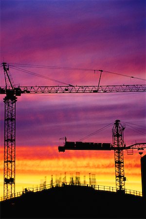 simsearch:700-00066600,k - Silhouette of Construction Cranes At Sunset Foto de stock - Con derechos protegidos, Código: 700-00010583