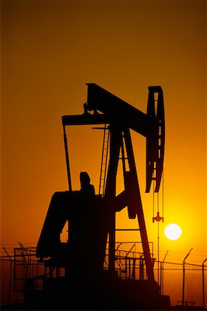 simsearch:614-08870083,k - Silhouette of Oil Pump Jack at Sunset Long Beach, California, USA Stock Photo - Rights-Managed, Code: 700-00010706