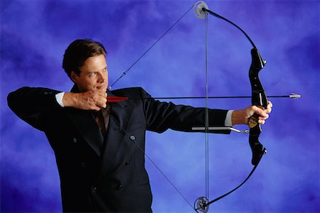 simsearch:700-01248748,k - Businessman Using Bow and Arrow Stock Photo - Rights-Managed, Code: 700-00010794