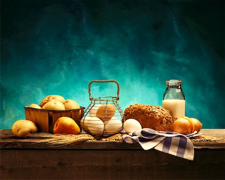 eggs milk - Harvest Table with Bread, Milk Eggs and Potatos Stock Photo - Rights-Managed, Code: 700-00011461
