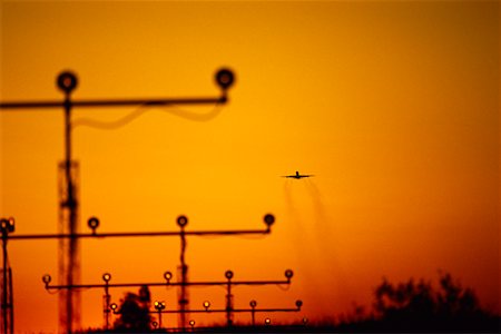 Airplane Taking Off at Sunset Stock Photo - Rights-Managed, Code: 700-00011564