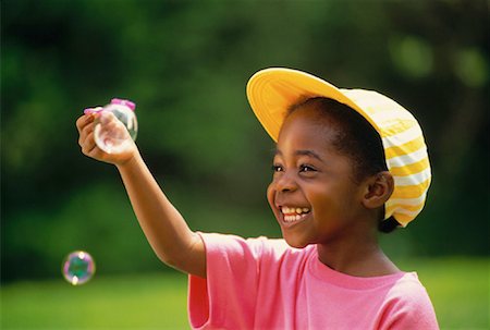 simsearch:700-00015310,k - Girl Blowing Bubbles Foto de stock - Con derechos protegidos, Código: 700-00012754