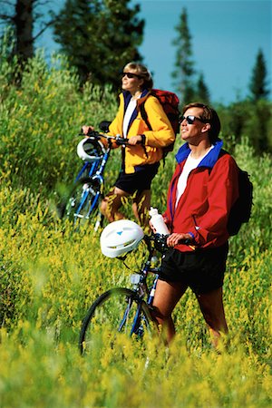 Couple Cycling, Kananaskis Country, Alberta, Canada Stock Photo - Rights-Managed, Code: 700-00012810