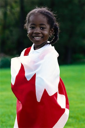 simsearch:700-00015310,k - Little Girl Wrapped in Canadian Flag Foto de stock - Con derechos protegidos, Código: 700-00012866