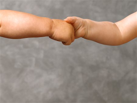 shaking hands kids - Babies Holding Hands Stock Photo - Rights-Managed, Code: 700-00012953