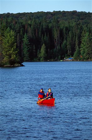 Man and Woman Canoeing, McIntosh Lake, Algonquin Park, ON, Canada Stock Photo - Rights-Managed, Code: 700-00013459
