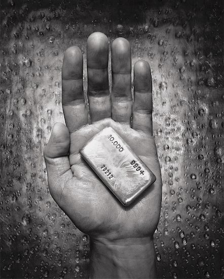 Hand Holding Ingot Stock Photo - Premium Rights-Managed, Artist: David Muir, Image code: 700-00024064