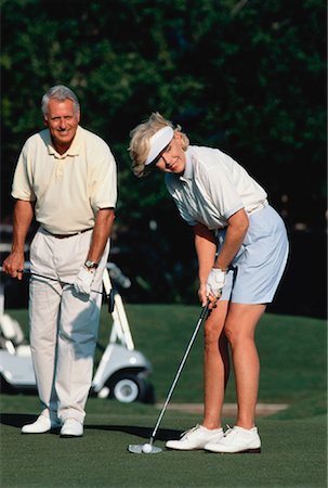 deerfield beach - Mature Couple Golfing, Deer Creek Golf Club, Deerfield Beach Florida, USA Stock Photo - Rights-Managed, Code: 700-00024457