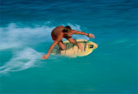 skimboard - Man Skimboarding in Swimwear Miami, Florida, USA Foto de stock - Direito Controlado, Número: 700-00024761