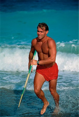 skimboard - Man in Swimwear, Holding Skimboard on Beach Miami, Florida, USA Foto de stock - Direito Controlado, Número: 700-00024762