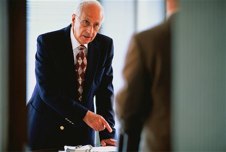 Mature Businessmen Talking in Office Stock Photo - Rights-Managed, Code: 700-00025026