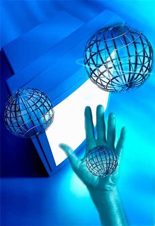 simsearch:700-00084993,k - Wire Globes with Computer Monitor and Hand Stock Photo - Rights-Managed, Code: 700-00025269