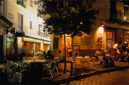 spain men cafe - Outdoor Cafe Santa Cruz Quarter Seville, Spain Stock Photo - Rights-Managed, Code: 700-00025354