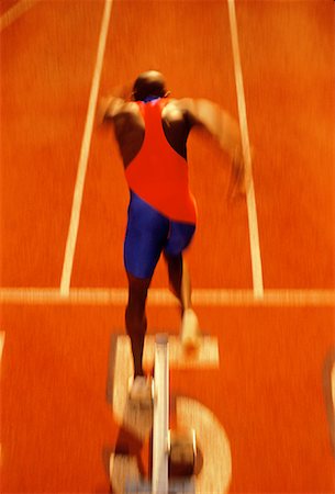 simsearch:700-00029794,k - Back View of Male Runner Leaving Starting Block Stock Photo - Rights-Managed, Code: 700-00025443