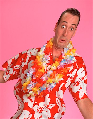 Portrait d'un homme portant la chemise hawaïenne et Leis Photographie de stock - Rights-Managed, Code: 700-00025516