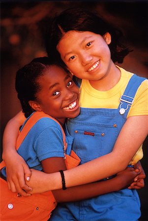 simsearch:700-00015310,k - Portrait of Two Girls Hugging Outdoors Foto de stock - Con derechos protegidos, Código: 700-00025650