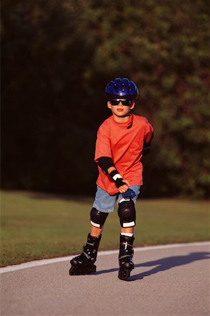 Garçon patin à roues alignées près de Miami, Floride, USA Photographie de stock - Rights-Managed, Code: 700-00025746