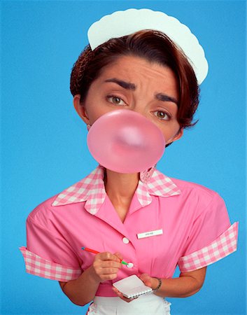funny pictures people chewing gum - Portrait of Waitress Blowing Bubble Gum Stock Photo - Rights-Managed, Code: 700-00025914