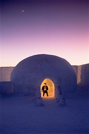 Man in Igloo at Dusk Jukkasjarvi North of Arctic Circle, Lapland, Sweden Stock Photo - Rights-Managed, Code: 700-00025967