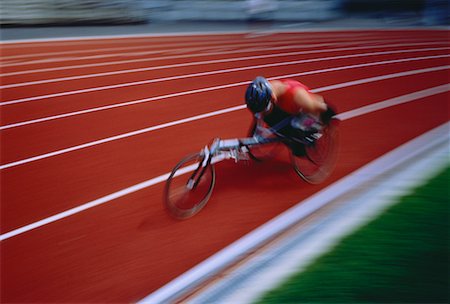 person wheelchair track - Wheelchair Athlete on Track Stock Photo - Rights-Managed, Code: 700-00026104