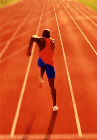 simsearch:700-00009893,k - Back View of Man Running on Track Stock Photo - Rights-Managed, Code: 700-00026306